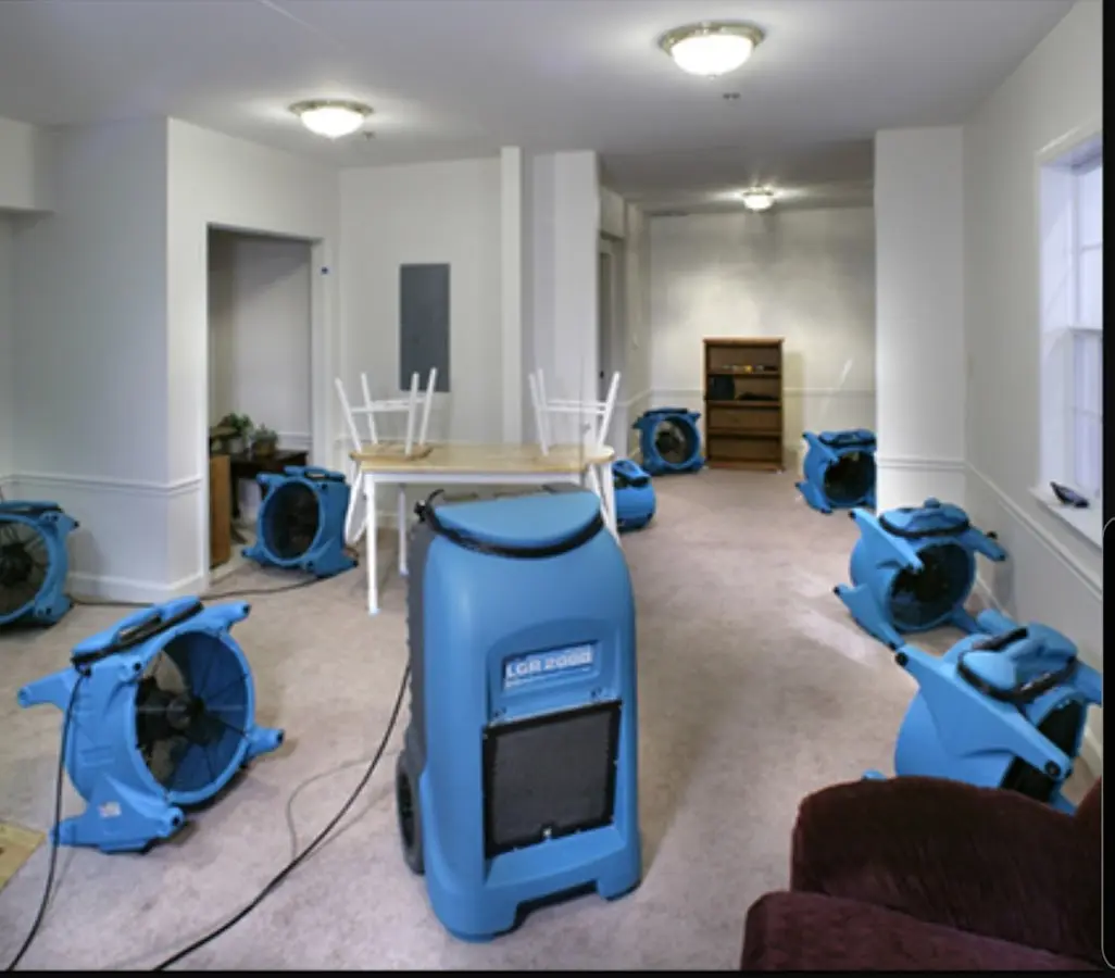 Air movers and dehumidifier setup for Water Damage Restoration in Trenton